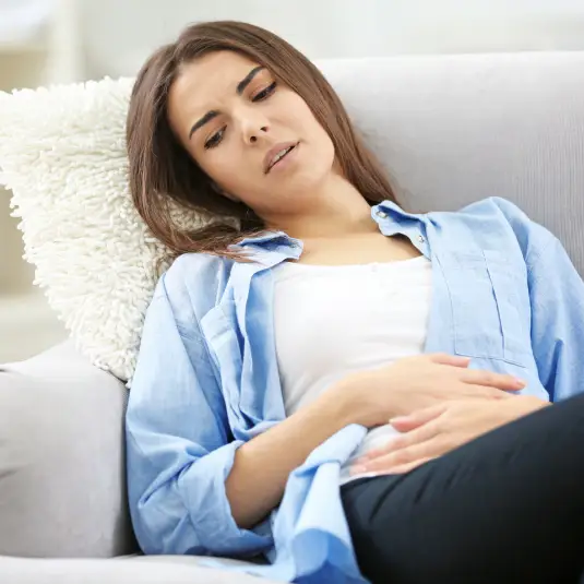 PMS-symptoms Woman experiences PMS symptoms