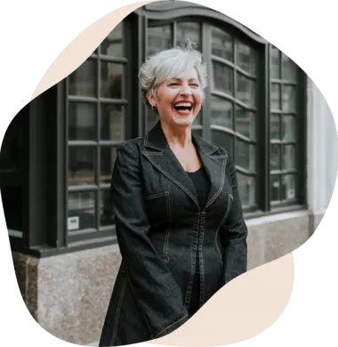 woman-laughing woman happily surviving hot flashes and night sweats