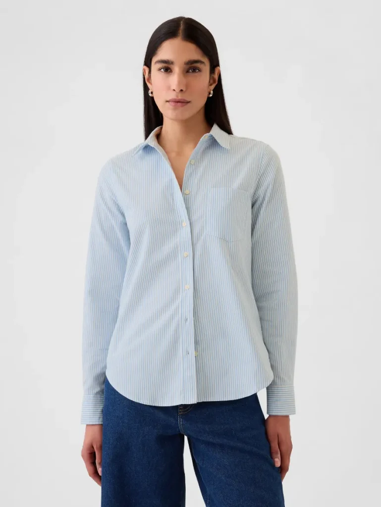 woman posing in cotton fabric blouse from Old Navy